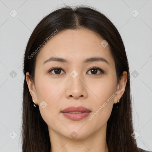 Joyful white young-adult female with long  brown hair and brown eyes