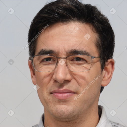 Joyful white middle-aged male with short  brown hair and brown eyes