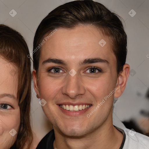 Joyful white young-adult male with medium  brown hair and brown eyes