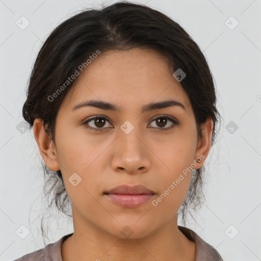 Neutral latino young-adult female with medium  brown hair and brown eyes