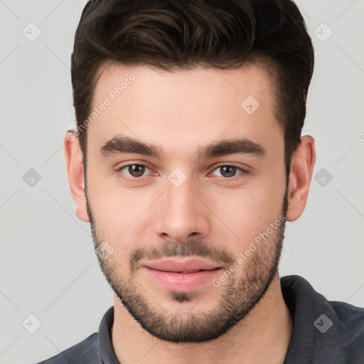 Neutral white young-adult male with short  brown hair and brown eyes