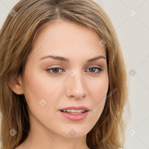 Joyful white young-adult female with long  brown hair and green eyes