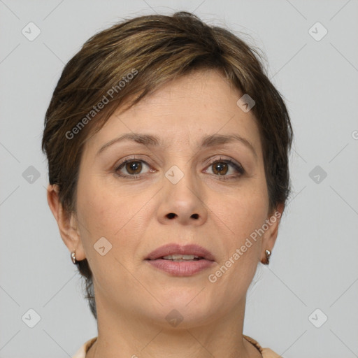 Joyful white adult female with short  brown hair and brown eyes