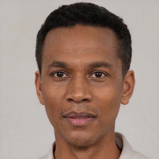 Neutral black adult male with short  black hair and brown eyes