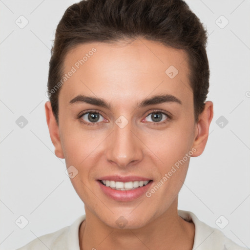 Joyful white young-adult female with short  brown hair and brown eyes