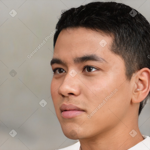 Neutral white young-adult male with short  black hair and brown eyes