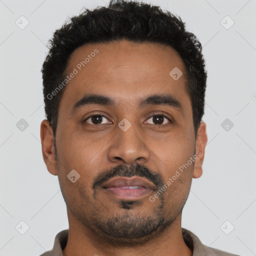 Neutral latino young-adult male with short  black hair and brown eyes