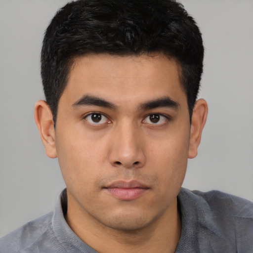 Neutral asian young-adult male with short  brown hair and brown eyes