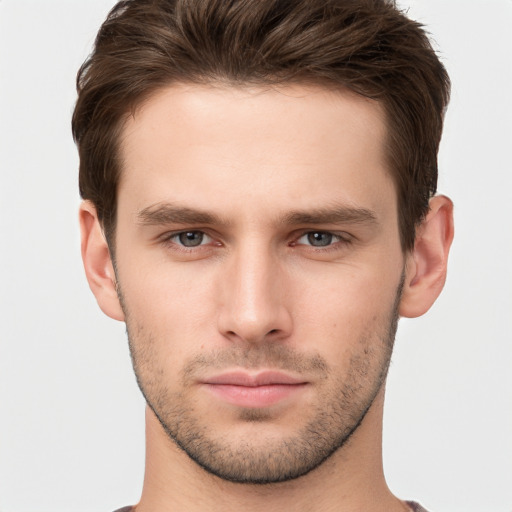 Neutral white young-adult male with short  brown hair and brown eyes