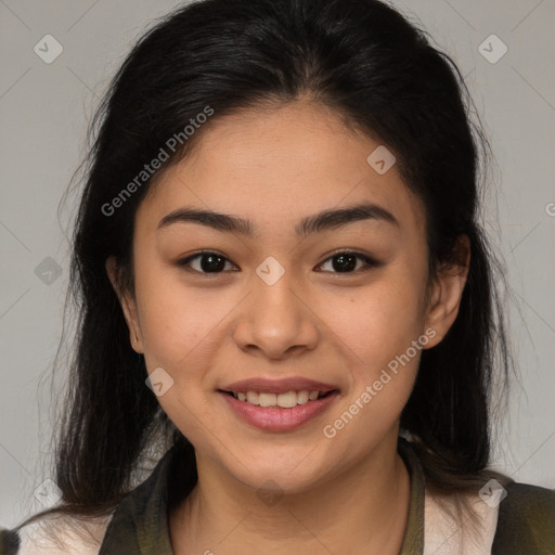 Joyful latino young-adult female with medium  brown hair and brown eyes