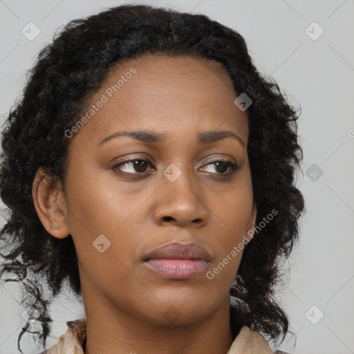 Neutral black young-adult female with long  brown hair and brown eyes