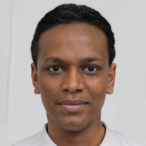 Neutral black young-adult male with short  black hair and brown eyes