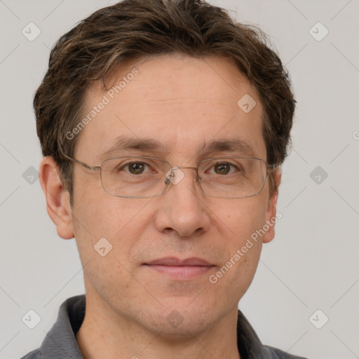 Joyful white adult male with short  brown hair and grey eyes