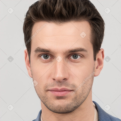 Neutral white young-adult male with short  brown hair and brown eyes