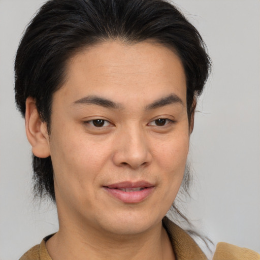 Joyful asian young-adult female with medium  brown hair and brown eyes