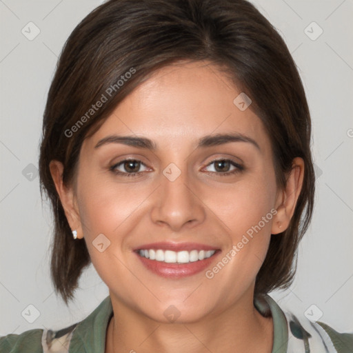 Joyful white young-adult female with medium  brown hair and brown eyes