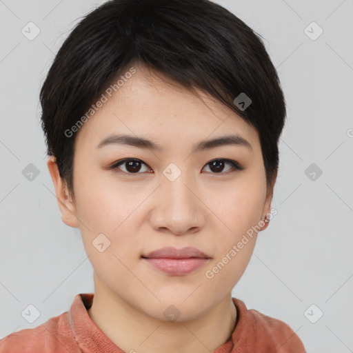 Joyful asian young-adult female with short  brown hair and brown eyes