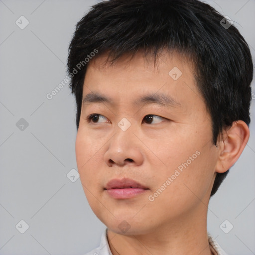 Neutral asian young-adult male with short  black hair and brown eyes