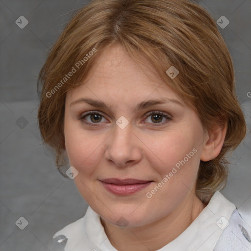 Joyful white adult female with medium  brown hair and blue eyes