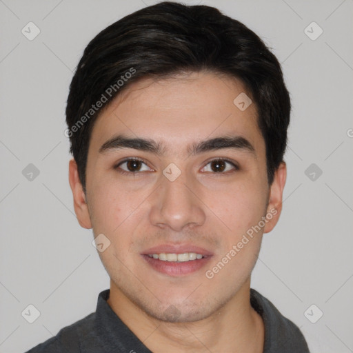 Joyful white young-adult male with short  black hair and brown eyes