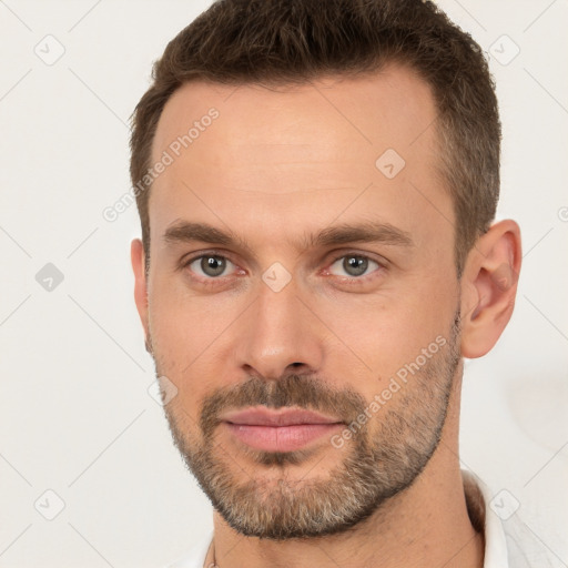 Neutral white young-adult male with short  brown hair and brown eyes