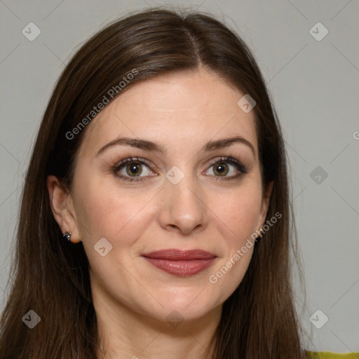 Joyful white young-adult female with long  brown hair and grey eyes