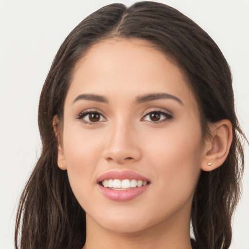 Joyful asian young-adult female with long  brown hair and brown eyes