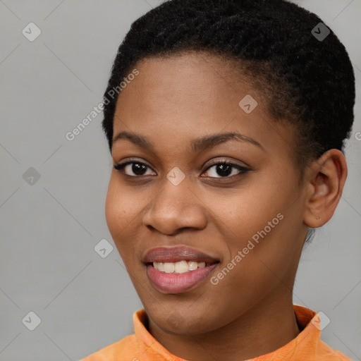 Joyful black young-adult female with short  brown hair and brown eyes