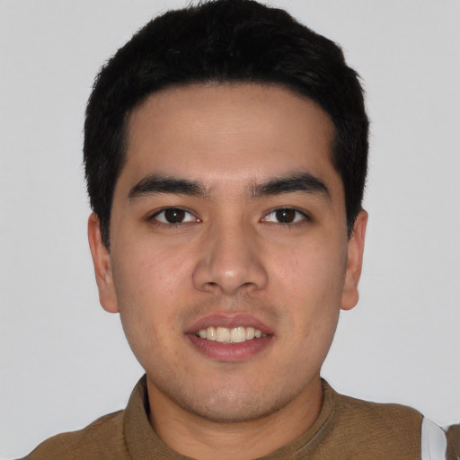 Joyful asian young-adult male with short  black hair and brown eyes