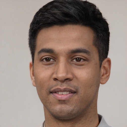 Neutral latino young-adult male with short  black hair and brown eyes