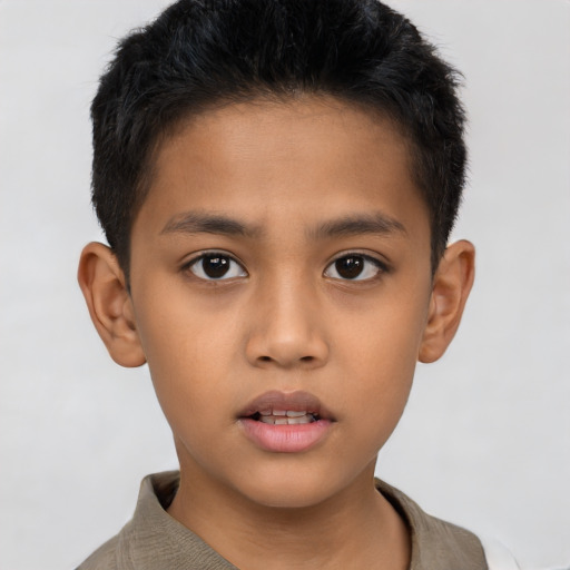 Neutral latino child male with short  brown hair and brown eyes