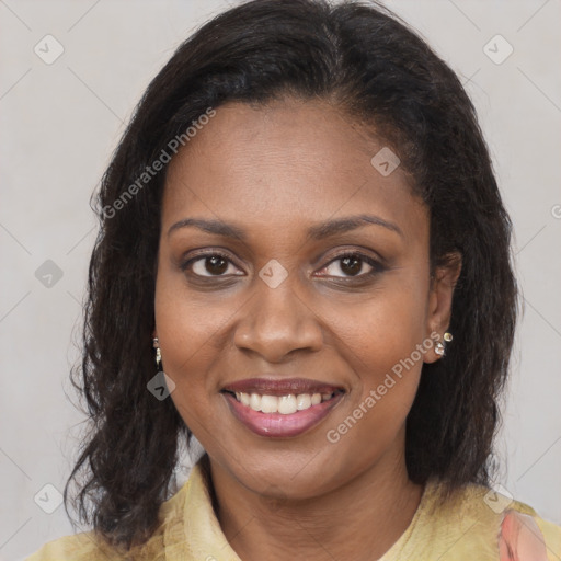 Joyful black young-adult female with medium  brown hair and brown eyes