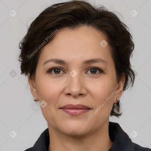 Joyful white adult female with medium  brown hair and brown eyes