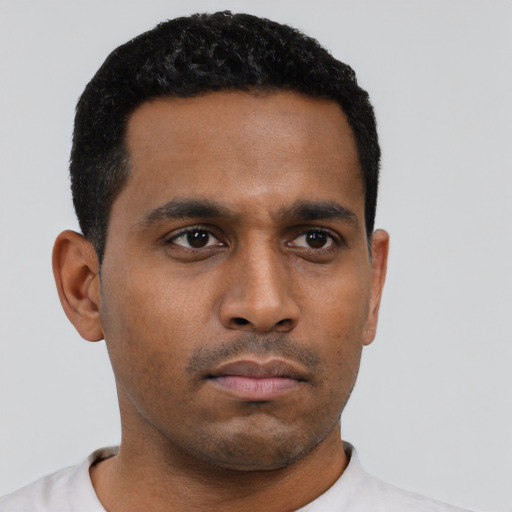 Neutral black young-adult male with short  black hair and brown eyes