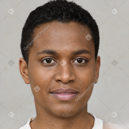 Joyful black young-adult male with short  brown hair and brown eyes