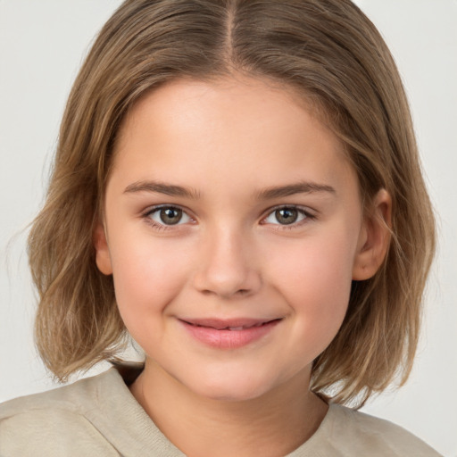 Joyful white child female with medium  brown hair and brown eyes