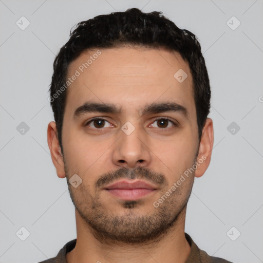 Neutral latino young-adult male with short  black hair and brown eyes