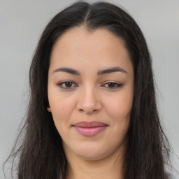 Joyful asian young-adult female with long  brown hair and brown eyes