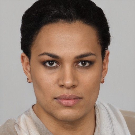 Neutral latino young-adult female with short  brown hair and brown eyes