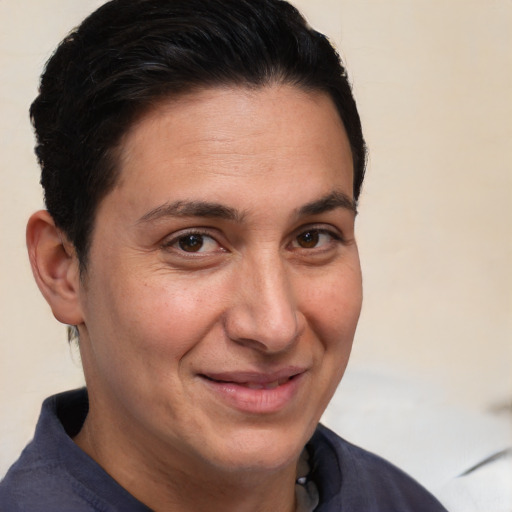 Joyful white adult female with short  brown hair and brown eyes