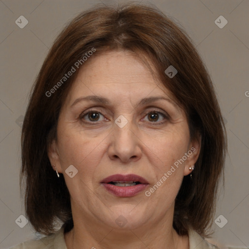 Joyful white adult female with medium  brown hair and brown eyes