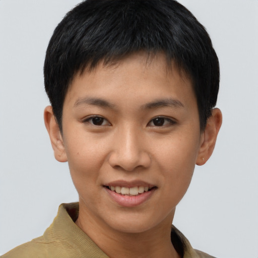 Joyful asian young-adult female with short  brown hair and brown eyes