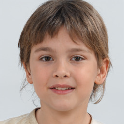 Joyful white child female with medium  brown hair and brown eyes