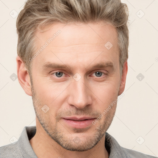 Joyful white adult male with short  brown hair and grey eyes