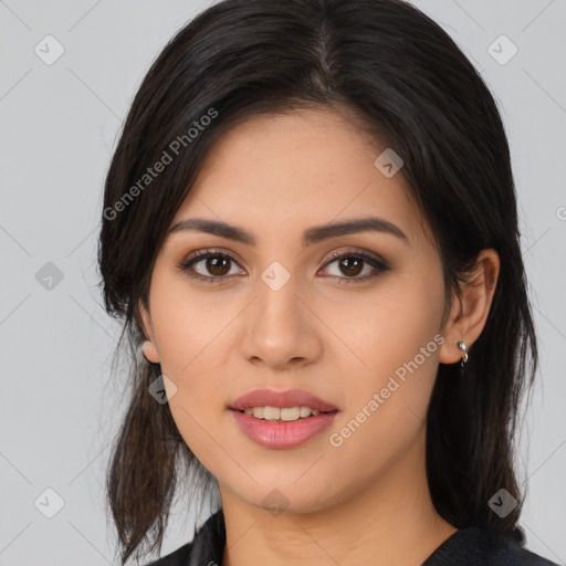 Joyful white young-adult female with long  brown hair and brown eyes