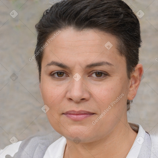 Joyful white adult female with short  brown hair and brown eyes