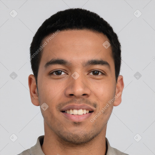 Joyful latino young-adult male with short  black hair and brown eyes