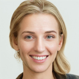 Joyful white young-adult female with medium  brown hair and blue eyes