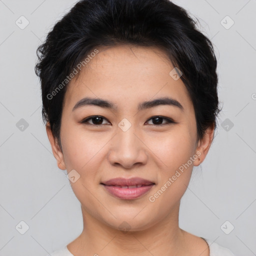 Joyful asian young-adult female with short  brown hair and brown eyes