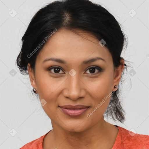 Joyful latino young-adult female with medium  brown hair and brown eyes